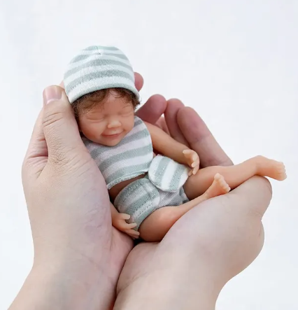 Mosolygós Mini Újjászületett baba